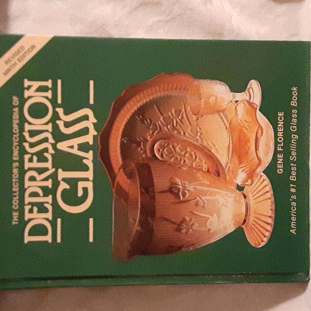 Hardcover Encyclopedia of depression glass. Excellent photos. Like new condition